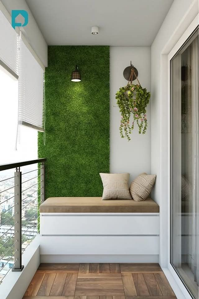 Balcony seating nook with artificial green wall and wooden deck