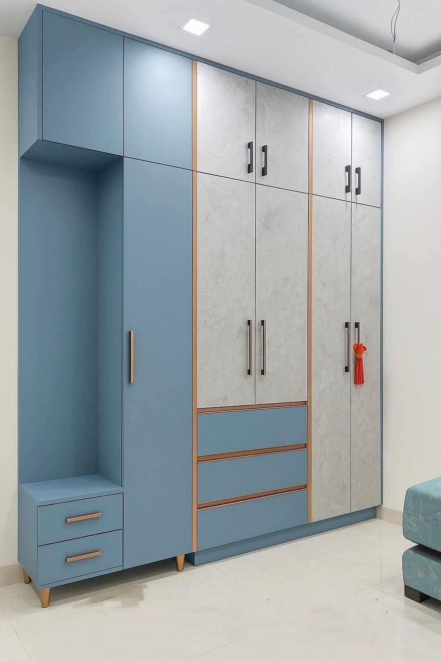 Blue tall wardrobe unit with drawers and open shelving