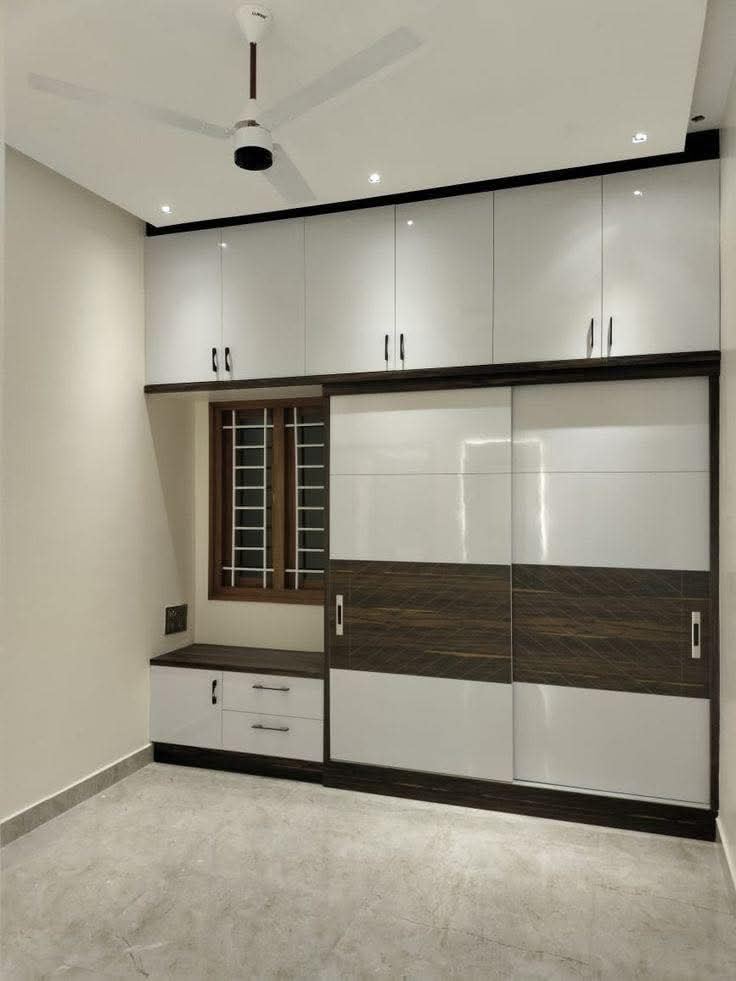 White and walnut bedroom wardrobe with overhead storage